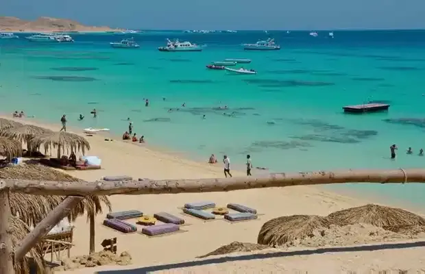 Relaxing on Hurghada beach during 11-day Classic Vacations Travel Egypt