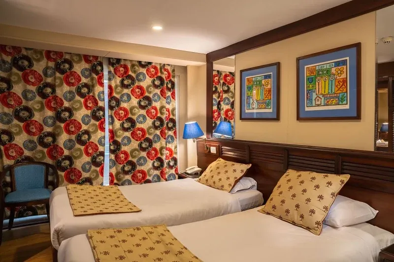 Kira Nile Cruise comfortable twin bedroom onboard the cruise