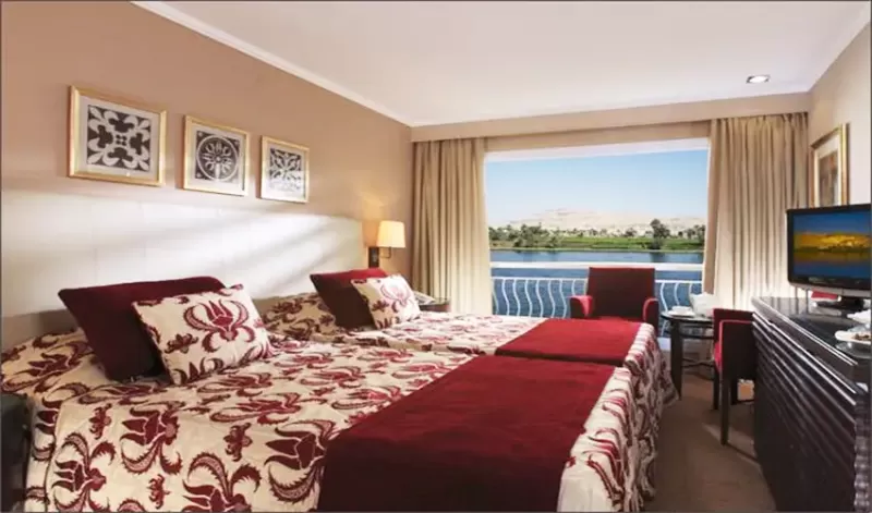 Steigenberger Legacy Nile Cruise dining area with panoramic Nile views