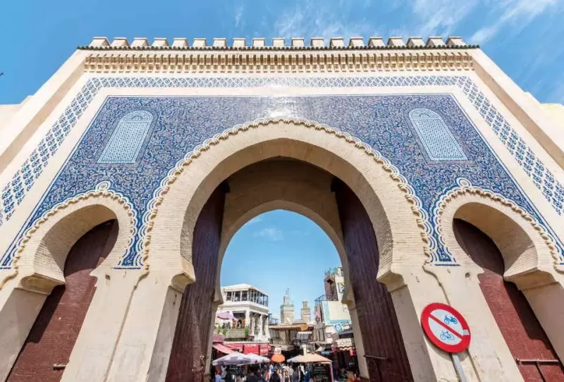 Begin your Moroccan adventure at Bab Boujloud, the iconic Blue Gate of Fez