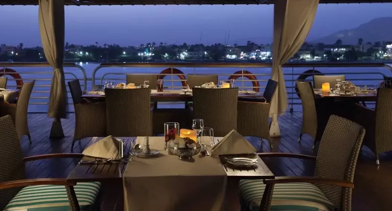 MS Acamar Nile Cruise sun deck with shaded loungers overlooking the tranquil Nile