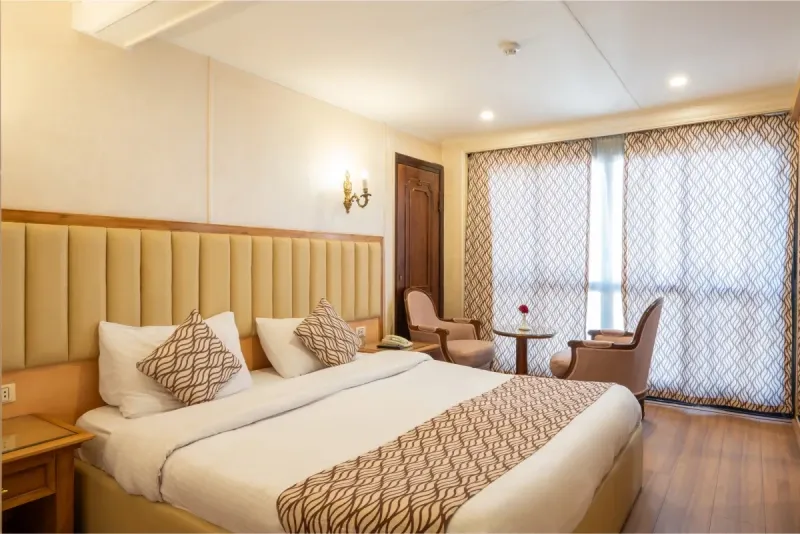 Kleos Nile Cruise elegant bedroom cabin with Nile River view