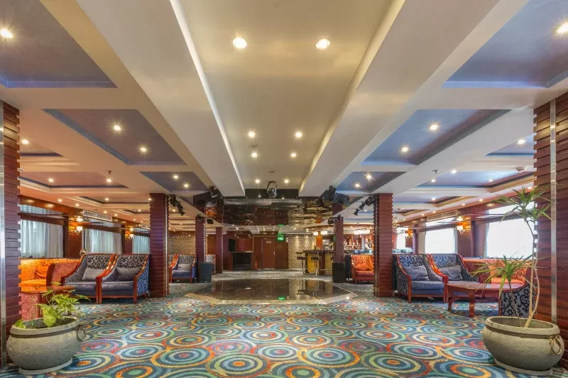 Enjoy the lounge area from your suite on the Blue Shadow I Luxor Aswan Nile Cruise