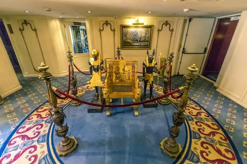 Grand lounge aboard Sonesta St. George Nile Cruise – opulent seating area with classical décor and panoramic Nile views