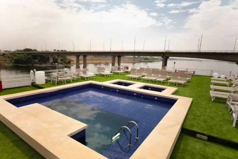 Relax by the pool on the Semiramis II Nile Cruise during your Luxor to Aswan journey