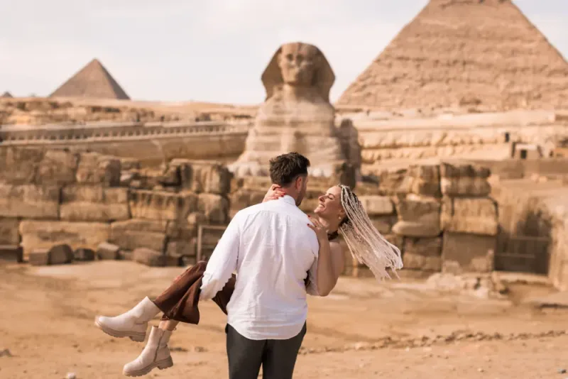 Standing beside the Great Sphinx on 11-day Classic Egypt Tours in Cairo