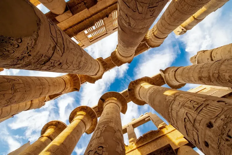 Karnak Temple in Luxor, Egypt, featuring massive columns and ancient hieroglyphs