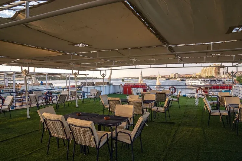 Kira Nile Cruise relaxing on the sundeck with panoramic Nile views