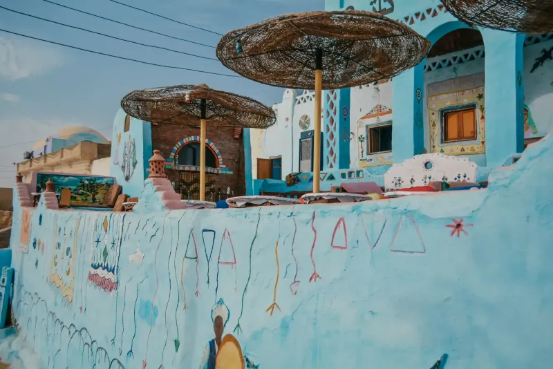 Tourists visiting a Nubian village in Aswan to discover local traditions and culture