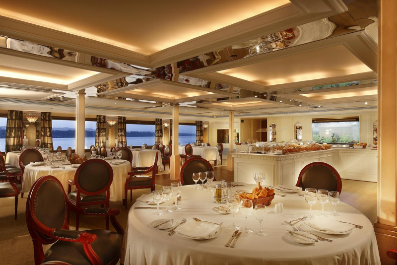 MS Nile Goddess Nile Cruise– exquisite dining lounge with sweeping Nile panoramas