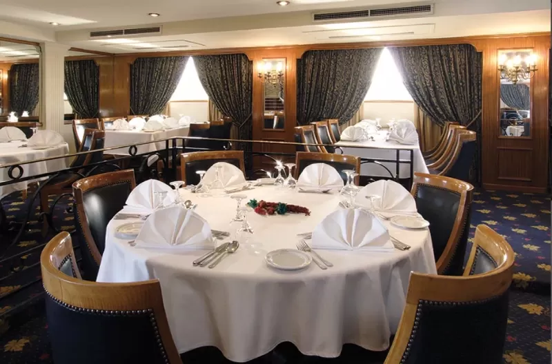 Relax and enjoy a luxurious dining experience aboard the Jaz Crown Prince Nile Cruise