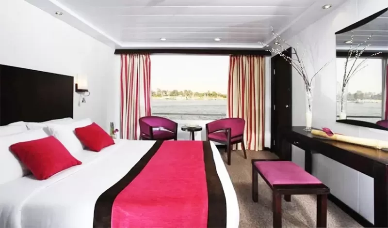 Spacious and elegant cabin aboard MS Movenpick Royal Lily Nile cruise – Nile views through large panoramic windows