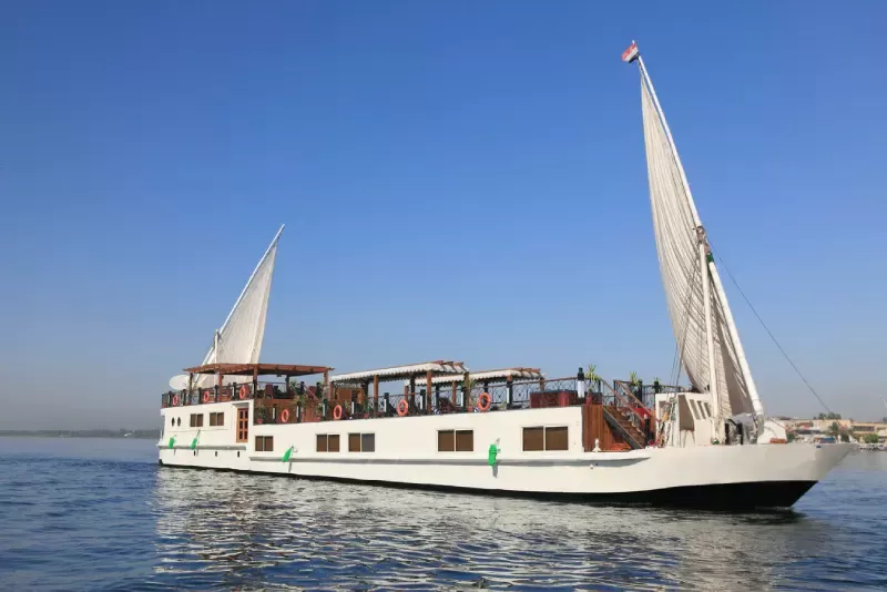 Merit Dahabiya Nile Cruise sailing peacefully between Luxor and Aswan