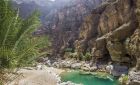 Wadi Shab turquoise canyon and hiking experience included in Saudi Arabia to Oman tour