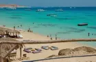 Relaxing on Hurghada beach during 11-day Classic Vacations Travel Egypt