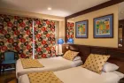 Kira Nile Cruise comfortable twin bedroom onboard the cruise