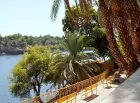Felucca cruise in Aswan Egypt offering scenic views of the Nile River and traditional Egyptian sailing boats