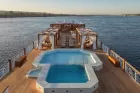 Relaxing moments on the sun deck of Steigenberger Senator Nile Cruise – sunbeds, open skies, and breathtaking Nile views