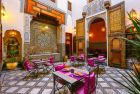 Relax in a traditional Fez Riad courtyard on your Morocco guided tour