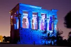 Colorful lights illuminating Philae Temple in Aswan Egypt during the famous Sound and Light Show