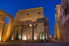 Luxor Temple at night illuminated along the Nile River in Egypt