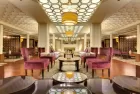 Lounge bar with cozy seating aboard Esplanade Nile Cruise