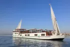 Merit Dahabiya Nile Cruise sailing peacefully between Luxor and Aswan